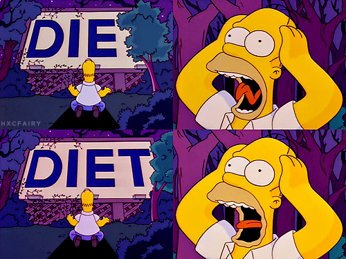 Homer Simpson davanti al cartello DIE - DIET