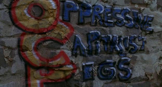 OCP Oppressive Capitalist Pigs, graffiti da Robocop 3