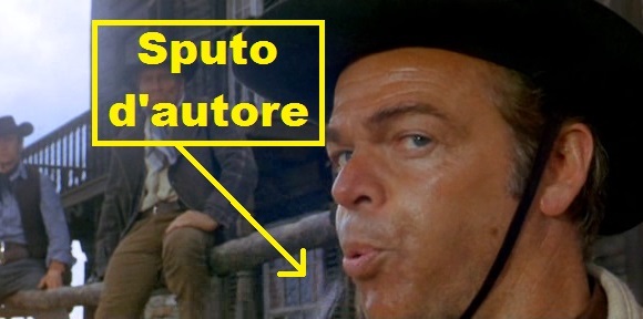 Scena da Per un pugno di dollari, pistolero che sputa prima di prepararsi ad uno scontro a fuoco. La vignetta legge: sputo d'autore